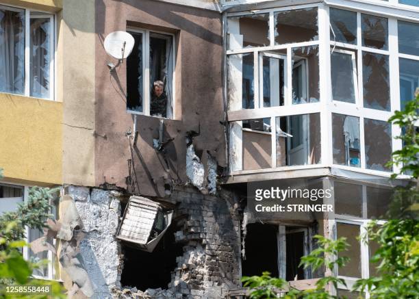 View of a damaged multi-storey apartment building after a reported drone attack in Voronezh on June 9, 2023.