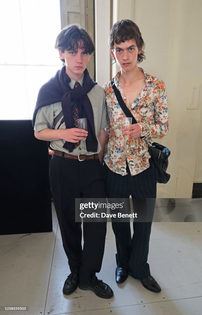 Reuben Larkin and guest attend the QASIMI SS24 Presentation at... News ...