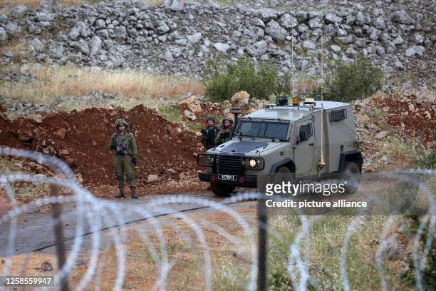 June 2023, Lebanon, Kfarchouba: Israeli soldiers take position at the Israeli side of the Lebanese-Israeli border at the area of Kfarchouba and...