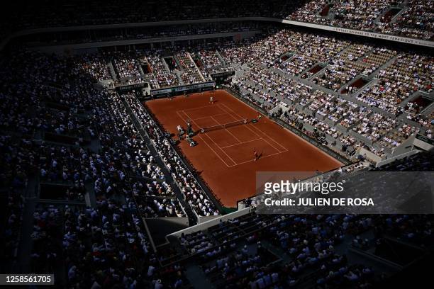 General view shows the men's singles semi-final match between Spain's Carlos Alcaraz Garfia and Serbia's Novak Djokovic on day thirteen of the...