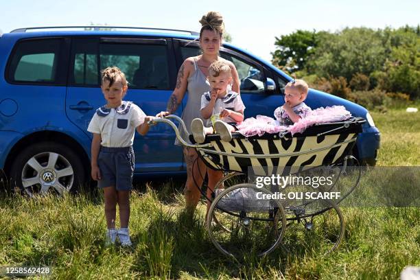 Sophie-Lee Hamilton poses for a photograph with her children Teddy-Rayn , aged 4, Tommy-Ryan , aged 2, and Romany-Rose, aged 10 months, on the second...