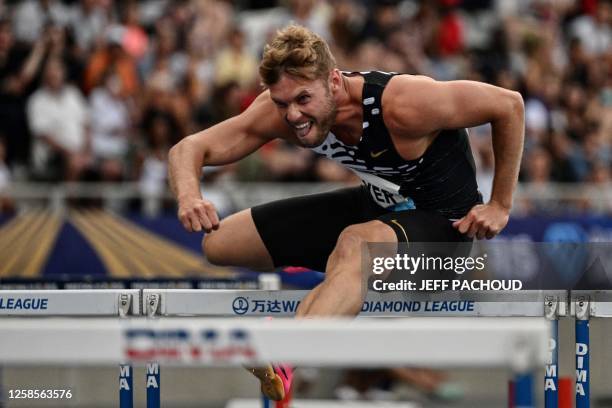 France's Kevin Mayer competes in the men's triathlon 110m hurdles event during the IAAF Diamond League "Meeting de Paris" athletics meeting at the...