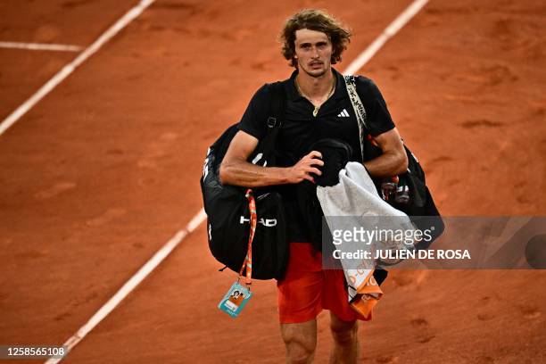 Germany's Alexander Zverev reacts as he leaves the court after losing against Norway's Casper Ruud at the end of their men's singles semi-final match...