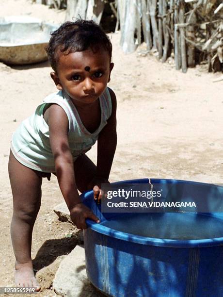 This 11-month old child from the Appuhamy family was borm in a UN refugee camp on the ouskirts of Trincomalee on Sri Lanka's north east coast 04 June...