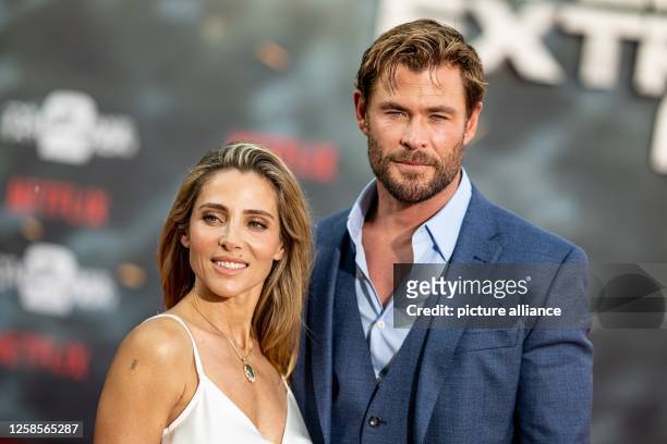 Chris Hemsworth, actor, and his wife Elsa Pataky, actress, arrive at a special screening of the movie "Tyler Rake: Extraction 2." The action film...