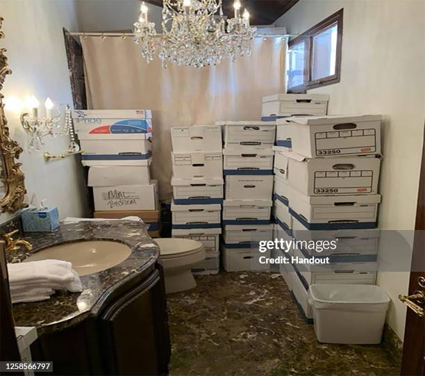 In this handout photo provided by the U.S. Department of Justice, stacks of boxes can be observed in a bathroom and shower in The Mar-a-Lago Club’s...