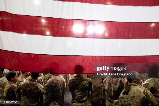 Service members gather to hear President Joe Biden and First Lady Jill Biden speak in support of Joining Forces, the initiative to support military...