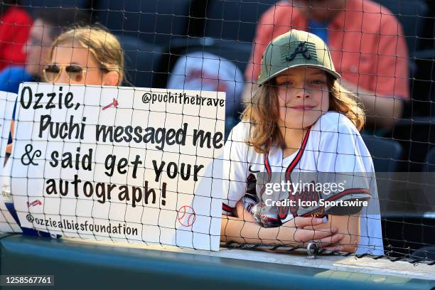 Young fans wait on Atlanta Braves second baseman Ozzie Albies heading into the Friday evening MLB game between the Atlanta Braves and the Washington...