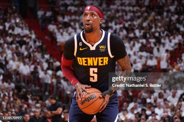 Kentavious Caldwell-Pope of the Denver Nuggets shoots a free throw during Game Four of the 2023 NBA Finals against the Miami Heat on June 9, 2023 at...