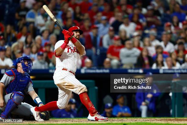 Kyle Schwarber of the Philadelphia Phillies hits a game winning home run in the ninth inning against the Los Angeles Dodgers in a game at Citizens...