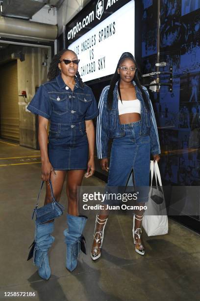 Chiney Ogwumike and Nneka Ogwumike of the Los Angeles Sparks arrives to the arena before the game against the Chicago Sky on June 9, 2022 at...