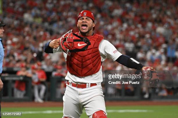 Willson Contreras of the St. Louis Cardinals reacts after throwing out Will Benson of the Cincinnati Reds attempting to steal second base in the...