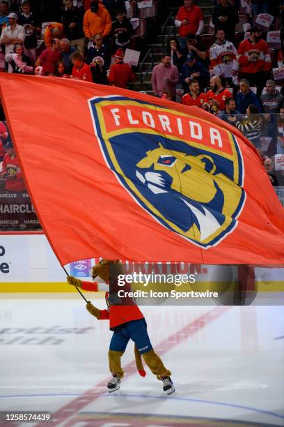 Florida Panthers mascot Stanley C. Panther waves the Florida Panther flag on the ice before the start of Game Three of the NHL Stanley Cup Final...