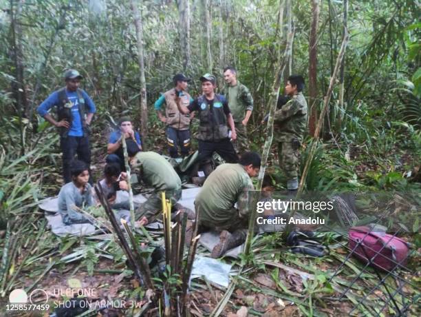 Colombian Military Forces help four children who survived 40 days in the Amazon jungle after their plane crashed in the department of Caqueta on June...