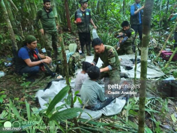 Colombian Military Forces help four children who survived 40 days in the Amazon jungle after their plane crashed in the department of Caqueta on June...