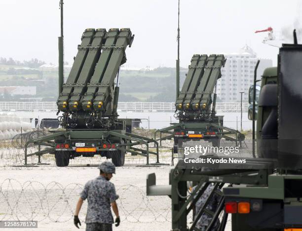 Japan Air Self-Defense Force Patriot Advanced Capability-3 interceptor missiles are pictured on June 10 on reclaimed land on Ishigaki Island in the...