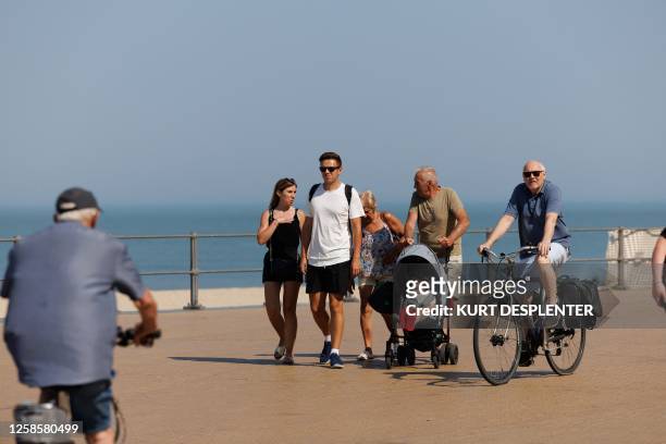 Illustration picture shows shows people enjoying nice weather the Belgian coast, in Oostende, on Saturday 10 June 2023. The KMI Royal Meteorological...