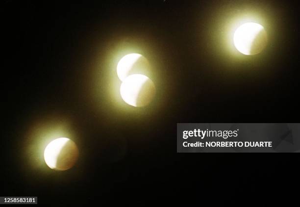 Time exposure shows the moon during the lunar eclipse 20 January, 2000 over Asuncion. Where skies were clear, the eclipse was visible in North and...