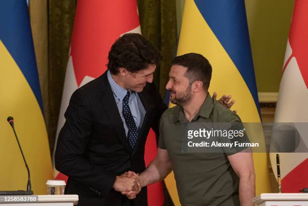 The prime minister of Canada Justin Trudeau and Ukrainian president Volodymyr Zelensky shake hands during their joint press conference on June 10,...