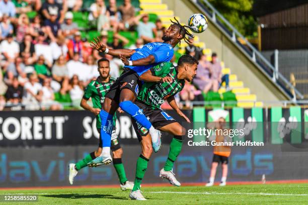 Joseph Baffo of Halmstad and Eliton Júnior of Varberg fighting for the ball during the Allsvenskan match between Varbergs BoIS and Halmstads BK on...
