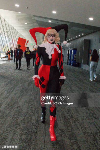 Cosplayer dressed as Harley Quinn heads to the ticket line during the OzComicCon 2023. Oz Comic Con Melbourne! The event brought together a vibrant...