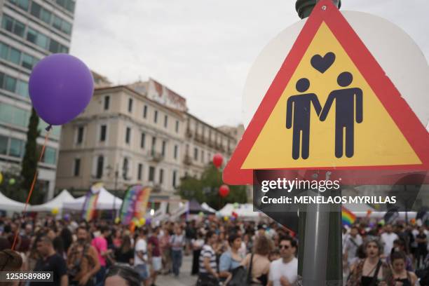 People participate at the annual Athens Pride parade, in Athens, Greece, on June 10, 2023