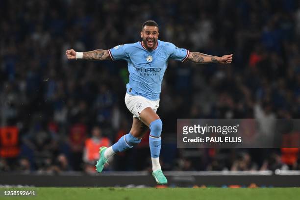 Manchester City's English defender Kyle Walker celebrates winning the UEFA Champions League final football match between Inter Milan and Manchester...