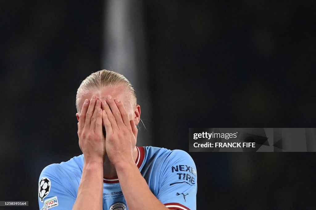 Halanda TOPSHOT - Manchester City's Norwegian striker Erling Haaland reacts ...