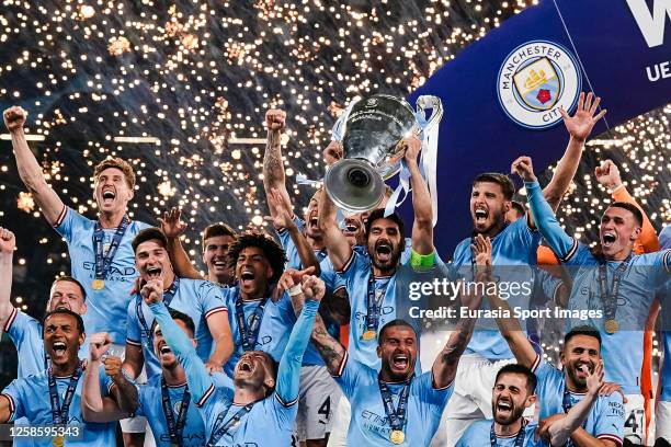 Ilkay Gundogan of Manchester City rises the 2023 Champions league trophy after winning Inter Milano during the UEFA Champions League 2022/23 final...