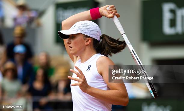 Iga Swiatek of Poland in action against Karolina Muchova of the Czech Republic in the Women's singles final on Day Fourteen of Roland Garros on June...