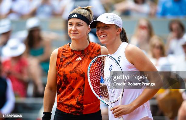 Karolina Muchova of the Czech Republic and Iga Swiatek of Poland pose for a photo before the Women's singles final on Day Fourteen of Roland Garros...