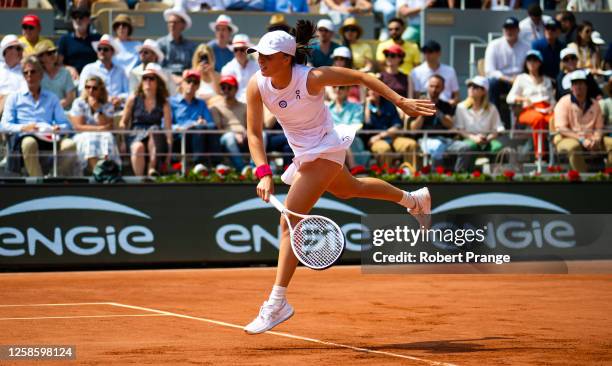Iga Swiatek of Poland in action against Karolina Muchova of the Czech Republic in the Women's singles final on Day Fourteen of Roland Garros on June...