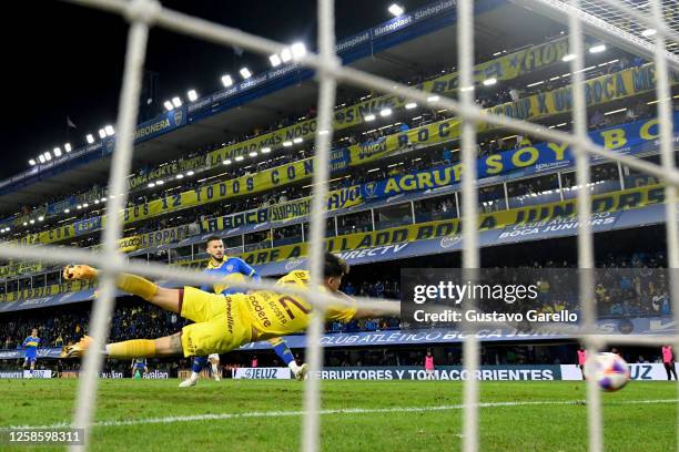Dario Benedetto of Boca Juniors scores the team's first goal during a Liga Profesional 2023 match between Boca Juniors and Lanus at Estadio Alberto...