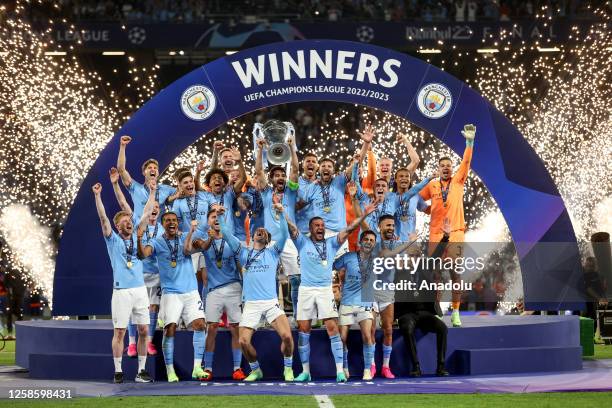 Ilkay Gundogan of Manchester City lifts the UEFA Champions League trophy after the team's victory in the UEFA Champions League 2022/23 final match...