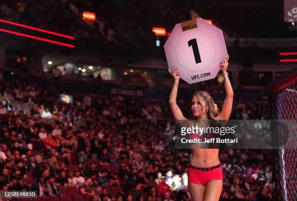 Octagon Girl Brittney Palmer shows the round during the UFC 289 event at Rogers Arena on June 10, 2023 in Vancouver, Canada.