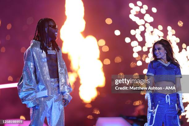 Artist and Grammy winner Burna Boy and Anitta during the pre-game ceremony during the UEFA Champions League 2022/23 final match between FC...