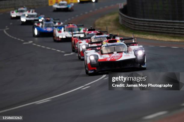 The Toyota Gazoo Racing GR010 Hybrid of Sebastien Buemi, Brendon Hartley, and Ryo Hirakawa in action during the 100th anniversary of the 24 Hours of...