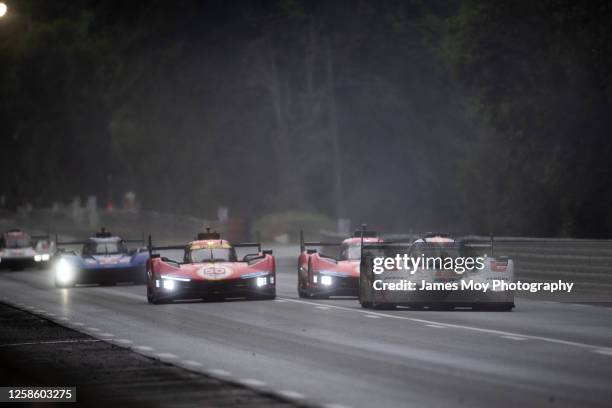 The Porsche Penske Motorsport, Porsche 963 of Dane Cameron, Michael Christensen, and Frederic Makowiecki in action during the 100th anniversary of...