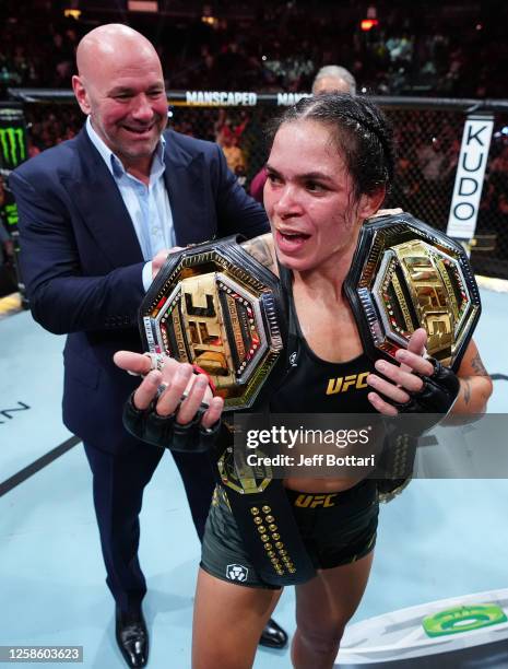 Amanda Nunes of Brazil celebrates her victory over Irene Aldana of Mexico in their women's bantamweight title fight during the UFC 289 event at...