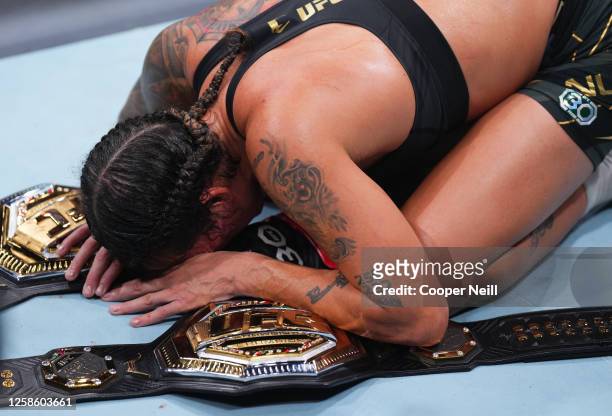 Amanda Nunes of Brazil announces her retirement after her victory over Irene Aldana of Mexico in their women's bantamweight title fight during the...