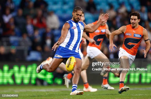 Aaron Hall of the Kangaroos in action during the 2023 AFL Round 13 match between the North Melbourne Kangaroos and the GWS Giants at Blundstone Arena...