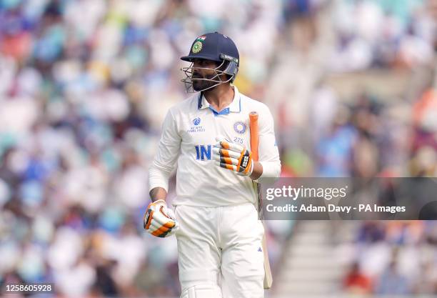 India's Ravindra Jadeja walks off the pitch after losing his wicket during day five of the ICC World Test Championship Final match at The Oval,...