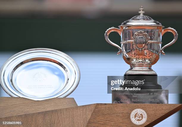 Roland Garros tennis tournament Womenâs Winner trophy and Runner up plate are pictured after the women's singles Final match on Day Fourteen of the...
