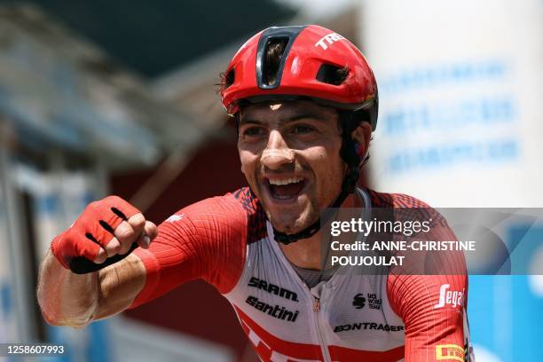 Trek - Segafredo's Italian rider Giulio Ciccone celebrates as he crosses the finish line to win the eighth stage of the 75th edition of the Criterium...