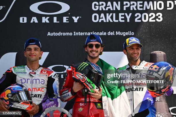 Second placed Ducati Spanish rider Jorge Martin, winner Ducati Italian rider Francesco Bagnaia, and third placed Ducati French rider Johann Zarco...