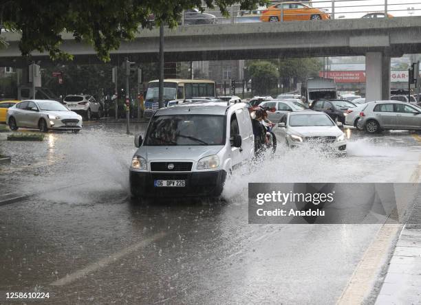 View of a flooded street after heavy rains hit Ankara, Turkiye on June 11, 2023. Vehicles had difficulty in advancing due to the water, some vehicles...