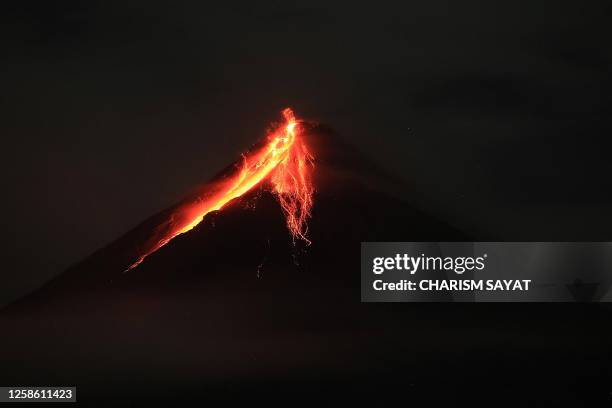 Mount Mayon spews lava during an eruption near Legazpi city in Albay province, south of Manila on June 11, 2023.