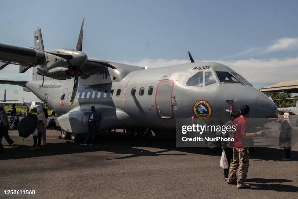 People visit military exhibition during Naval Airbase Open Day at Juanda Air Base in Surabaya, East Java Province, Indonesia on June 11, 2023. The...