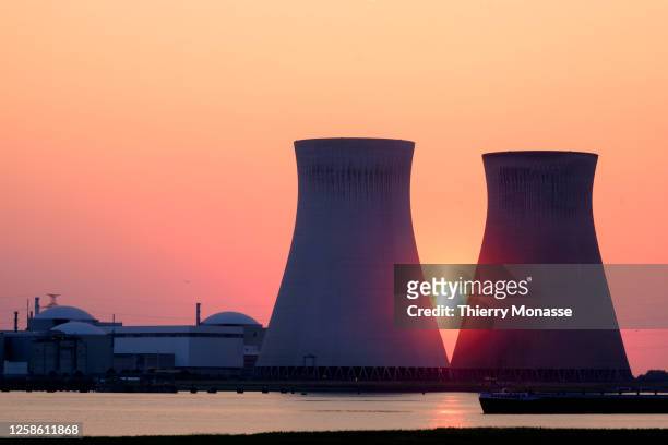 The 'Salamanca', a Dutch barge is docked on the Scheldt river in front of the Doel nuclear power station on June 10, 2023 in Antwerp, Belgium. The...