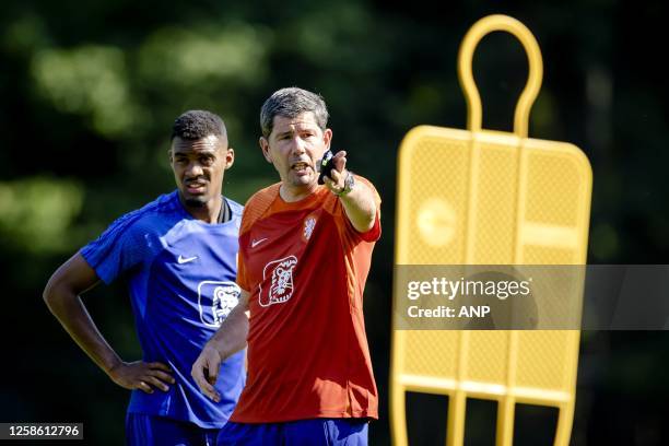 Ryan Gravenberch and Head Coach Erwin van de Looi during a training session of the young Orange on the KNVB Campus on June 11, 2023 in Zeist,...